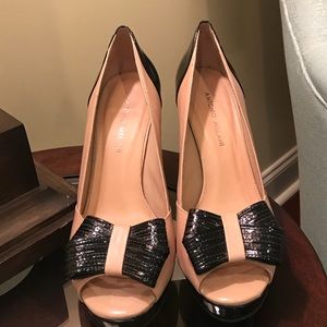 Black and Tan patent peep toe platform heels.